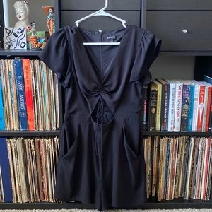 Black shorts romper. Flowy sleeves. With pockets.